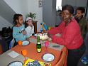 my wife brigitte serving cake to the kids and their friends